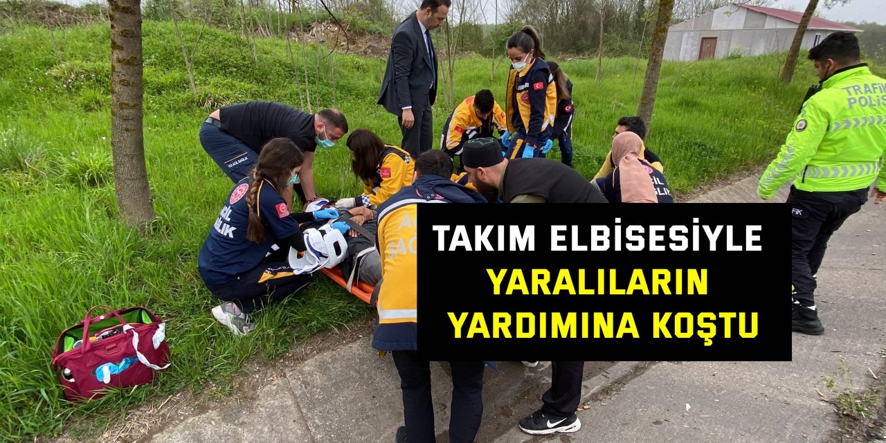 Takım elbisesiyle yaralıların yardımına koştu