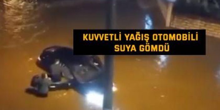 Kuvvetli yağış otomobili suya gömdü