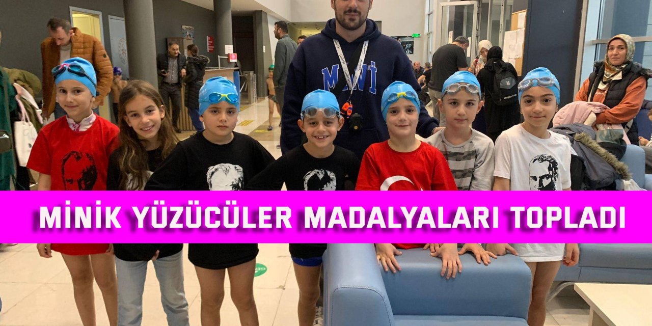 Minik yüzücüler madalyaları topladı