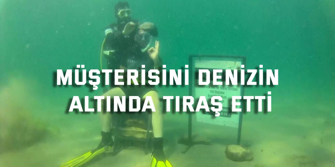 Müşterisini denizin altında tıraş etti