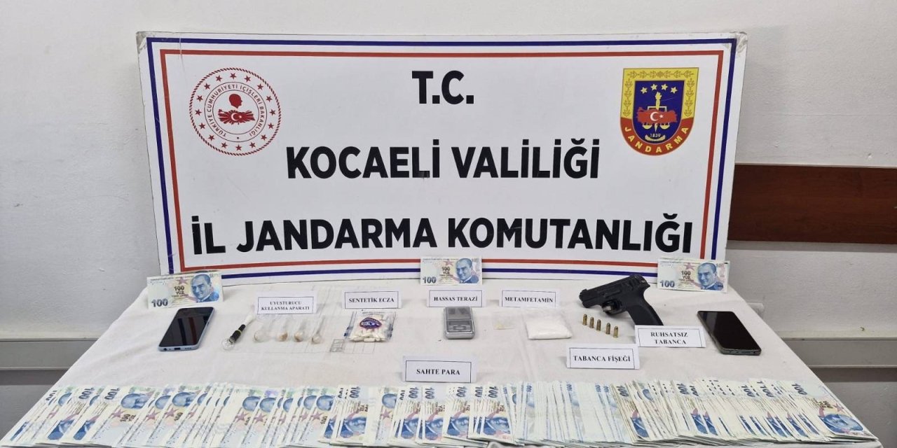 İzmit’te iş yerinde sahte para ve uyuşturucu ele geçirildi