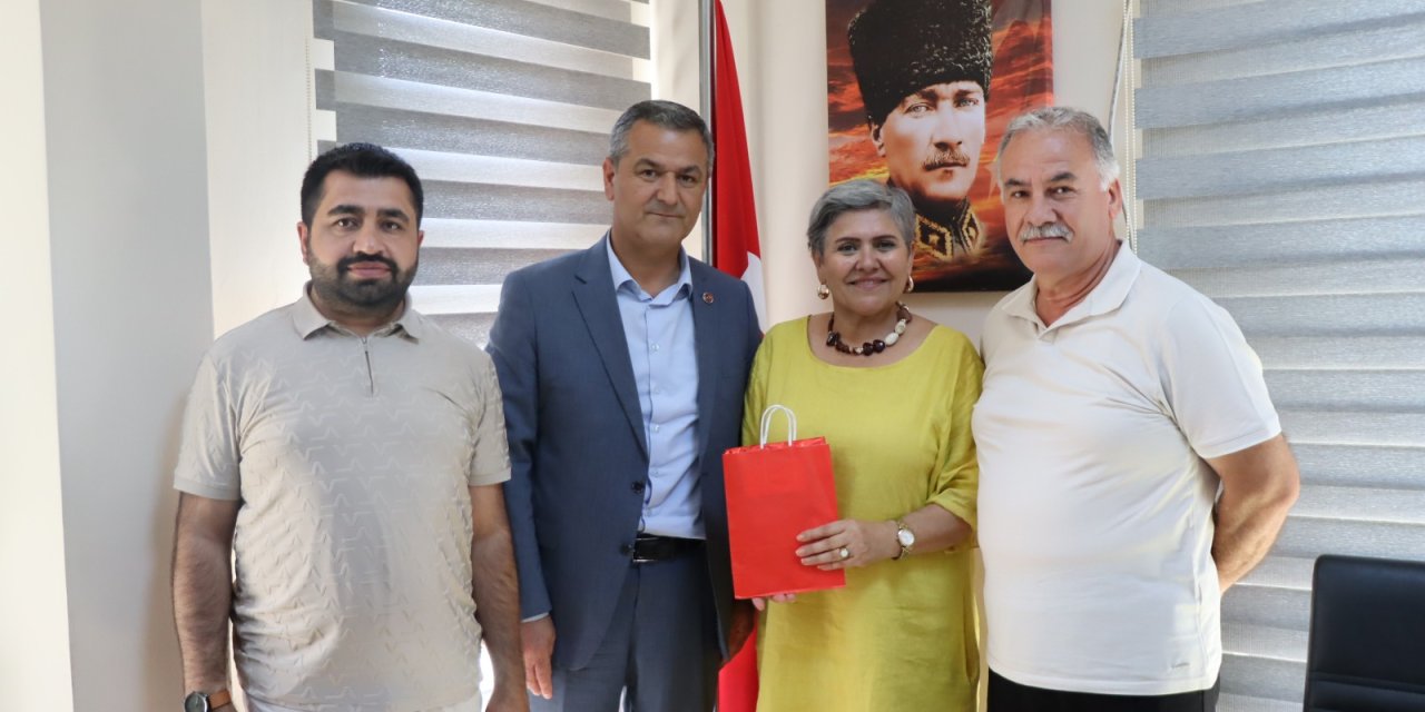 Muhtarlara doğum günü ziyareti