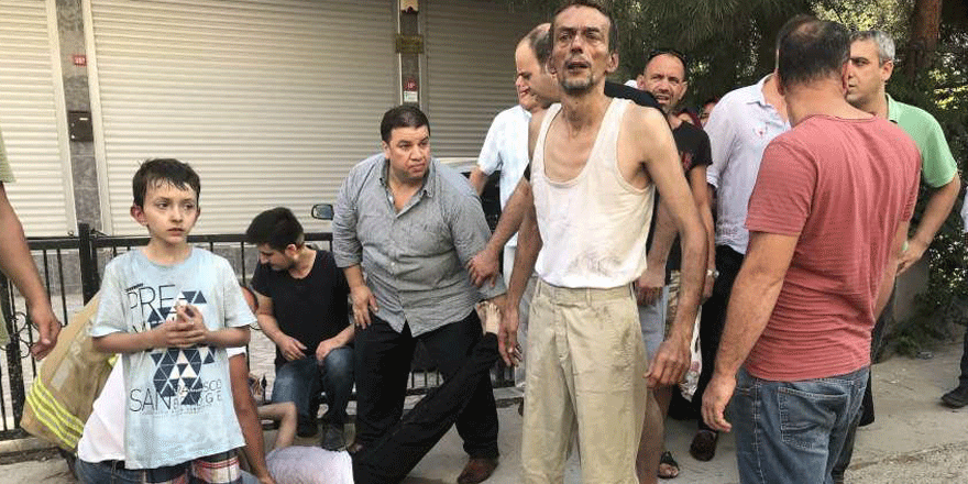 Evin yandığını görünce çocuklarını battaniyeye sararak camdan attı