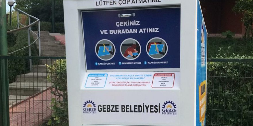 Giysiler çöpe değil kumbaraya