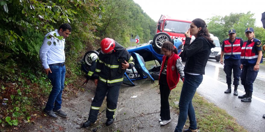 Takla atan otomobilden yara almadan kurtuldular