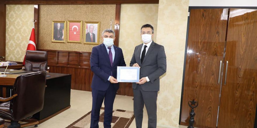 Başkan Şayir’e teşekkür belgesi