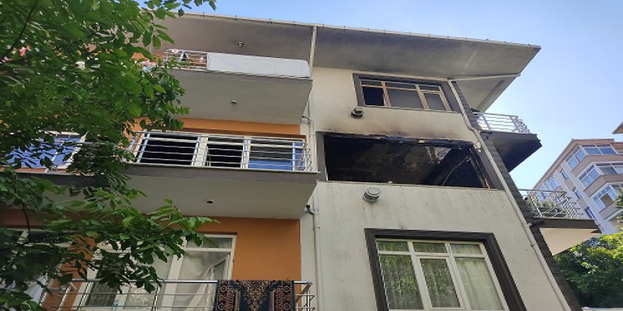 Yangında mahsur kalan çocuğu balkona tırmanıp kurtardılar