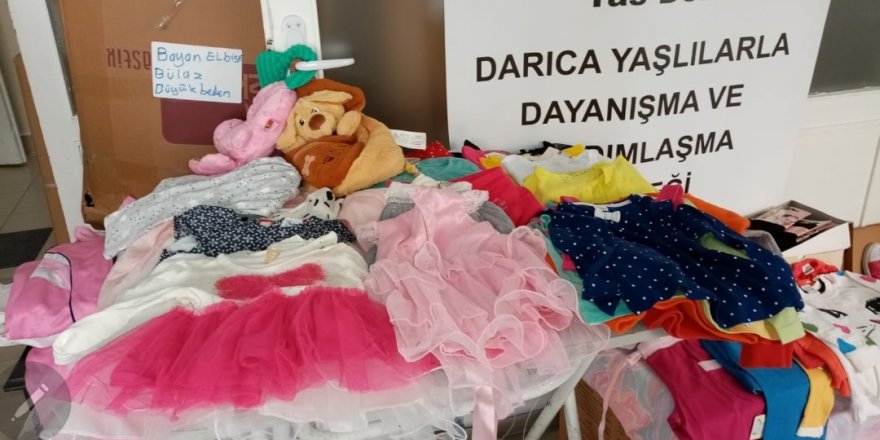 Yas-Der bayram öncesi çocukları giydirecek