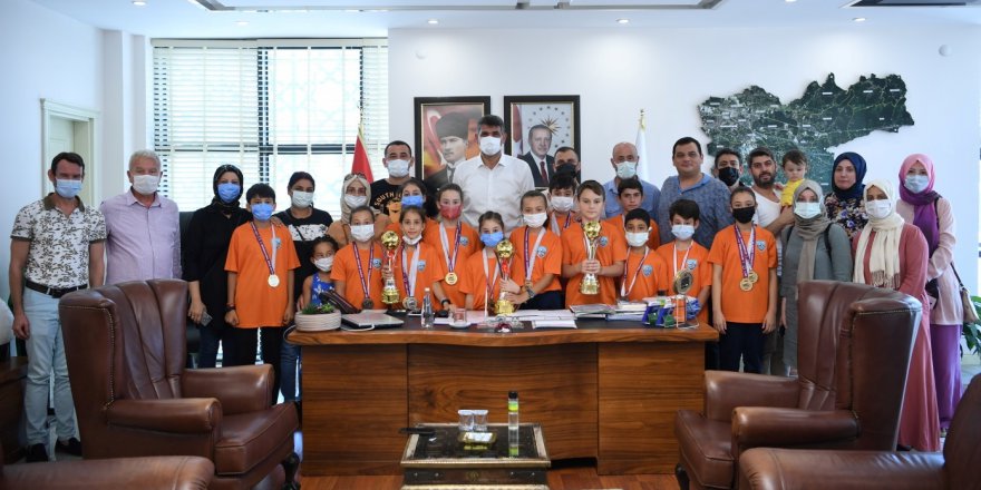 KOCAMAN, ŞAMPİYONLARI MİSAFİR ETTİ