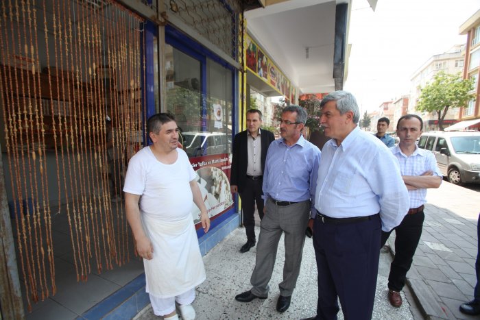 Başkanlardan esnaf turu